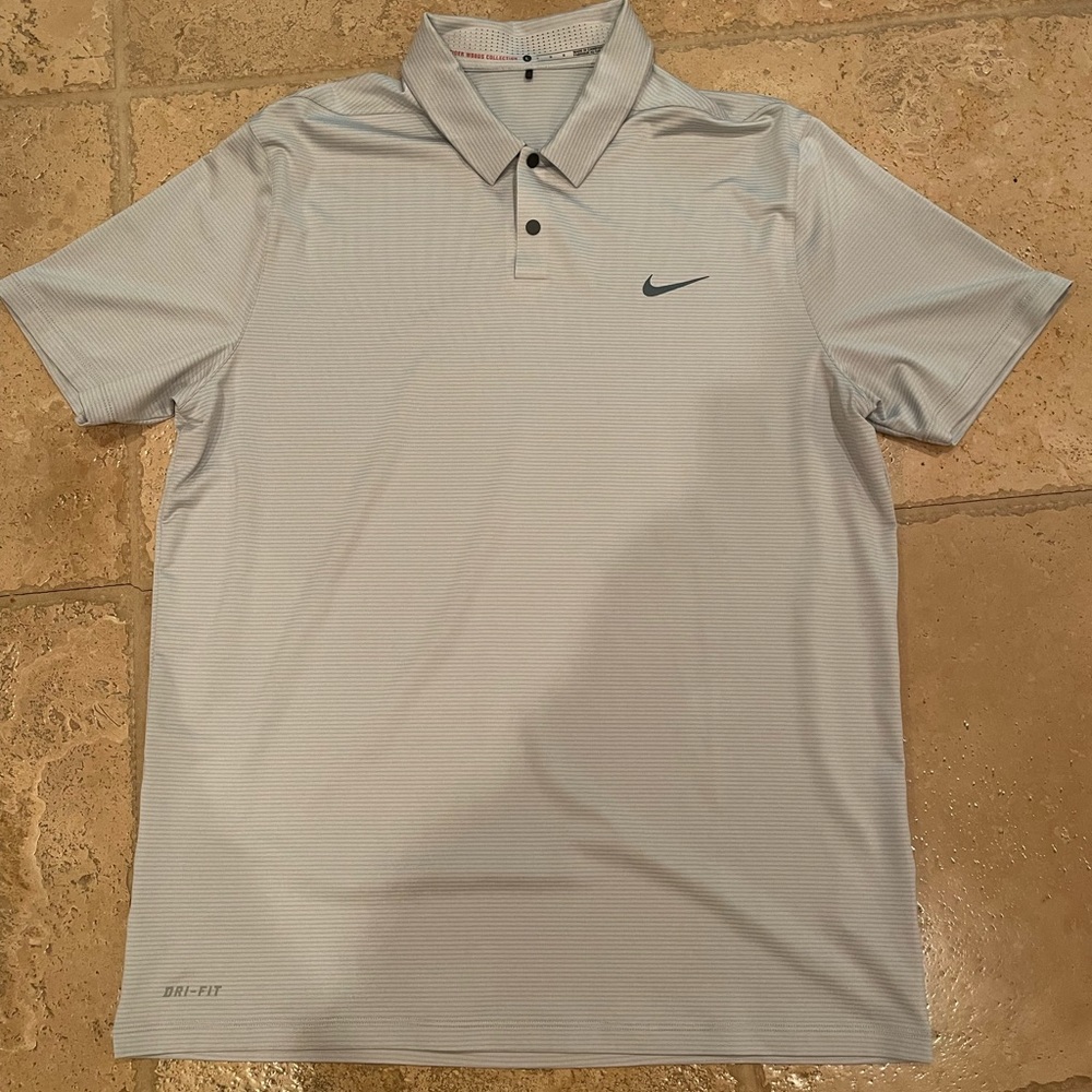 Size L, Tiger Woods collection polo. Worn once. Like-new condition.